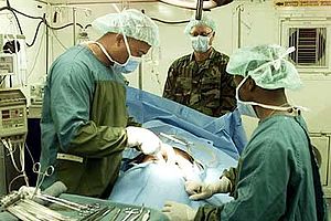 Image of a surgeon operating on a patient.